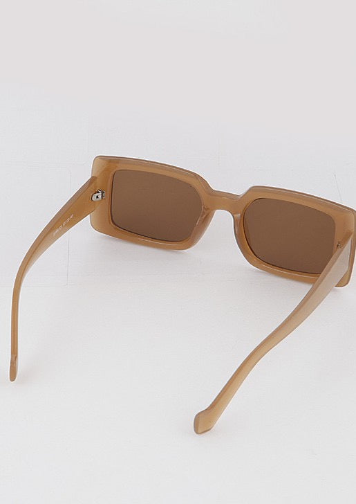 Sand colored oversized rectangle sunglasses.